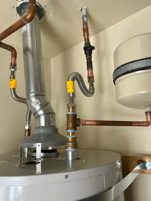 Water heater installation and plumbing repair in The Hollow